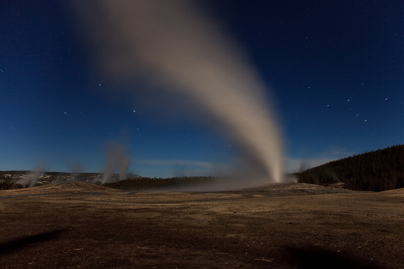Geysers erupting at night