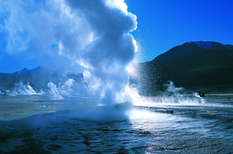 Geysers erupting in a desert