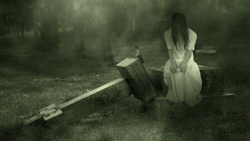 Ghost girl in a foggy graveyard