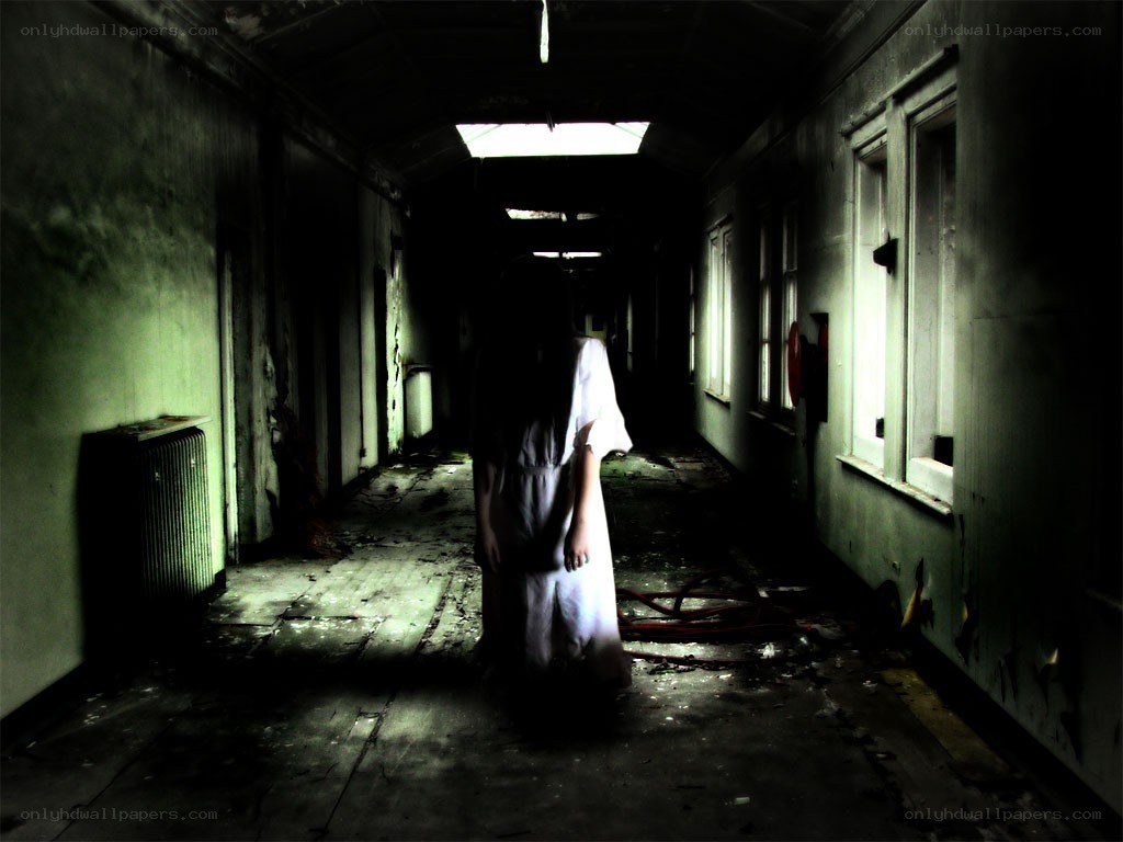 Ghost in an abandoned hallway