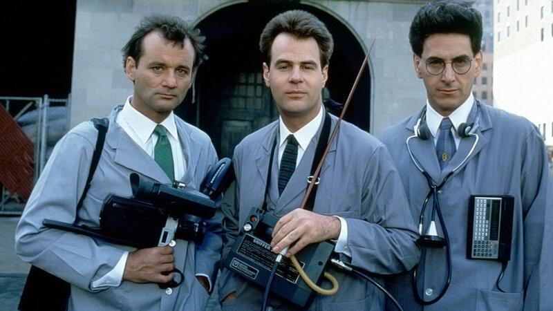 Ghostbusters team with equipment