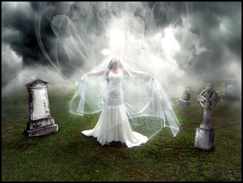 Ghostly bride in a cemetery
