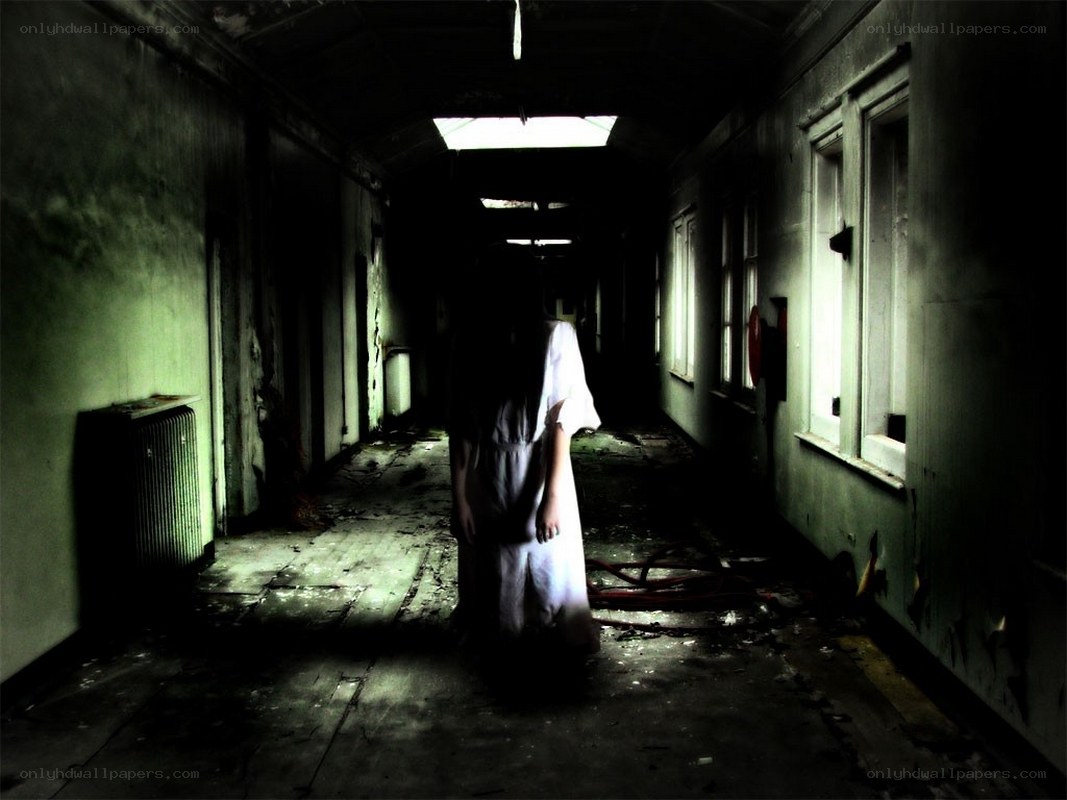 Ghostly figure in abandoned hallway