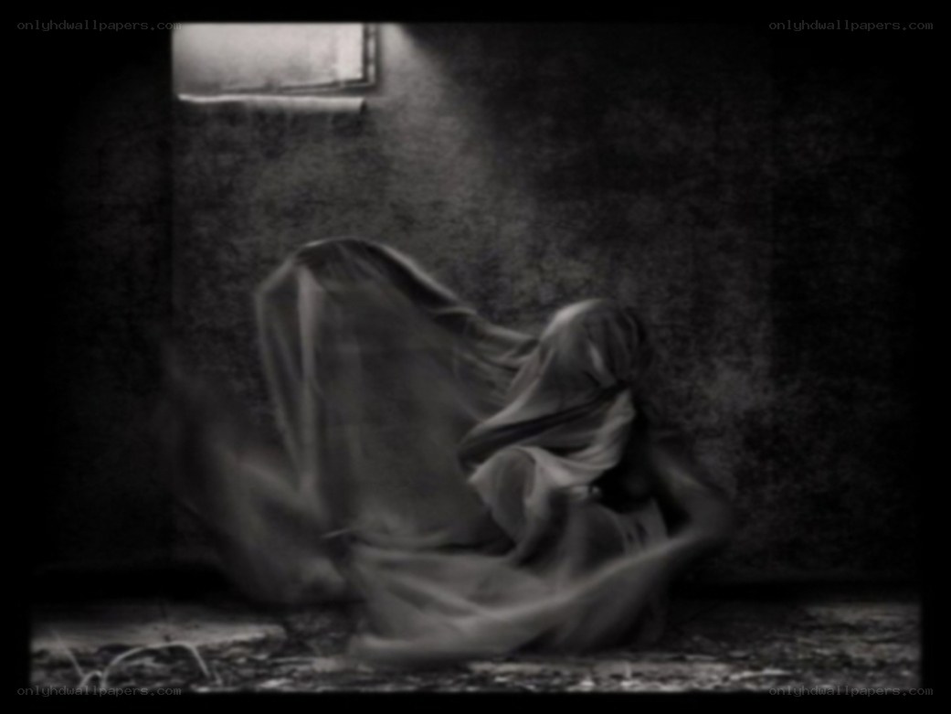 Ghostly figure in dark room