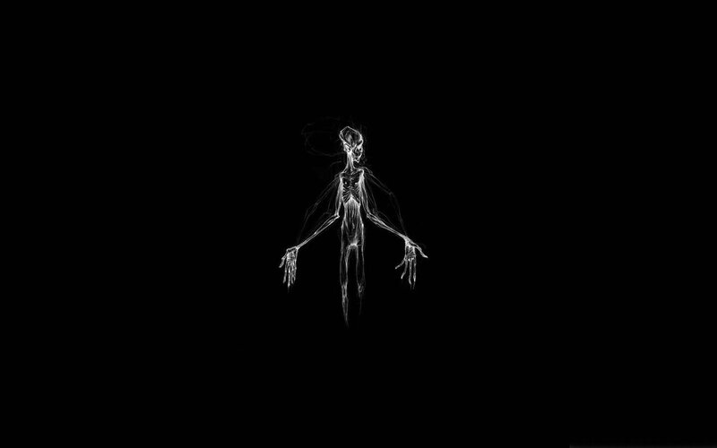 ghostly figure in darkness