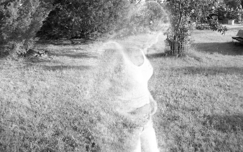 Ghostly Figure in Yard — Black