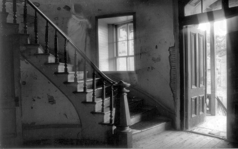 Ghostly figure on staircase
