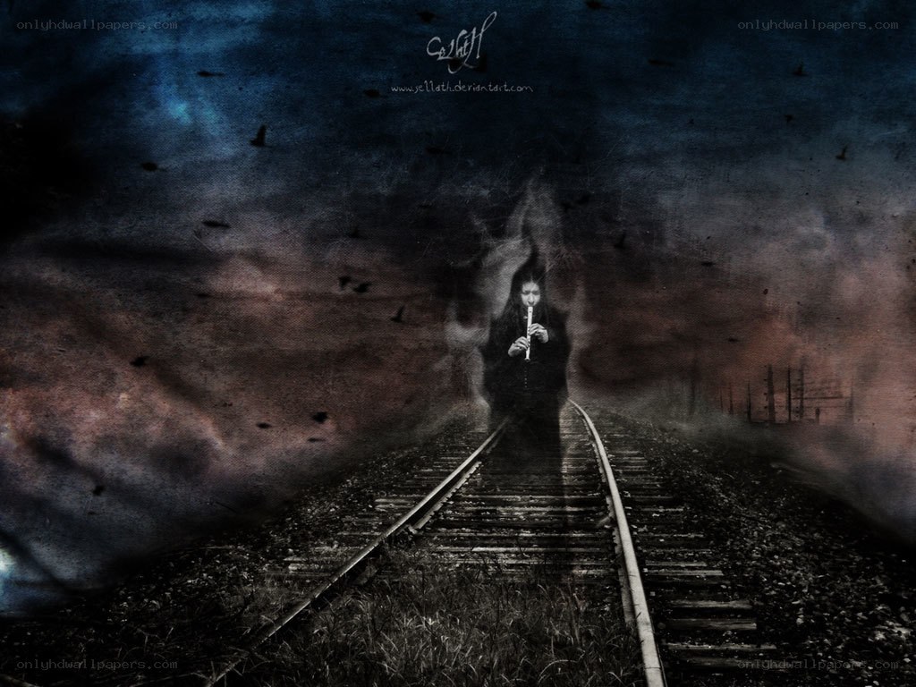 Ghostly figure on train tracks