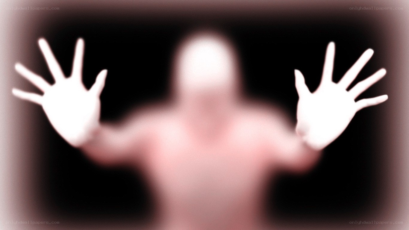 ghostly figure with outstretched hands
