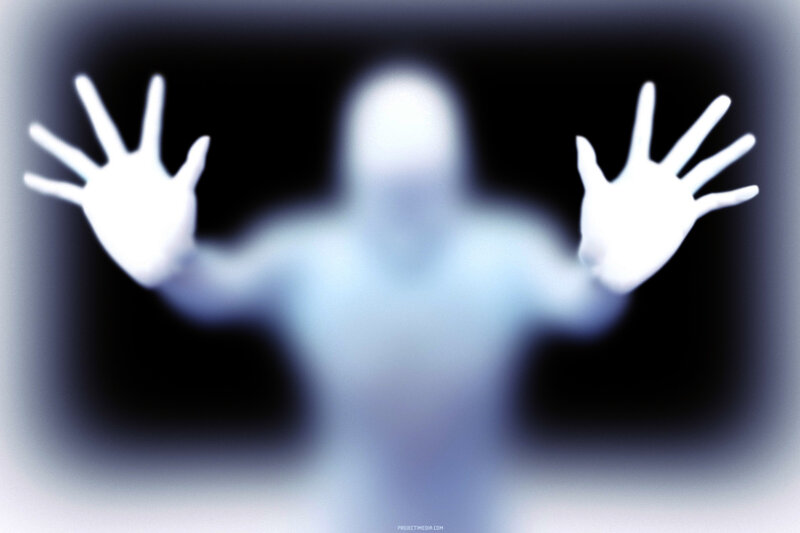 ghostly figure with outstretched hands
