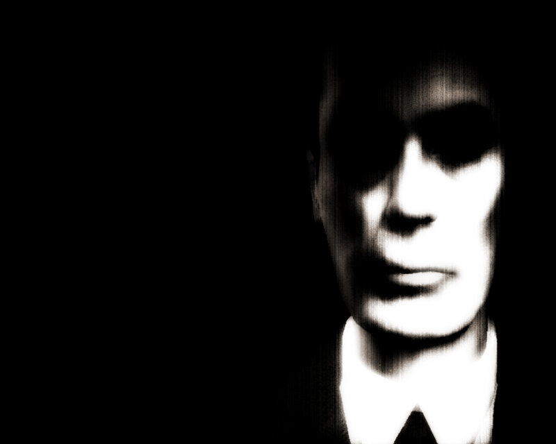 ghostly man in suit