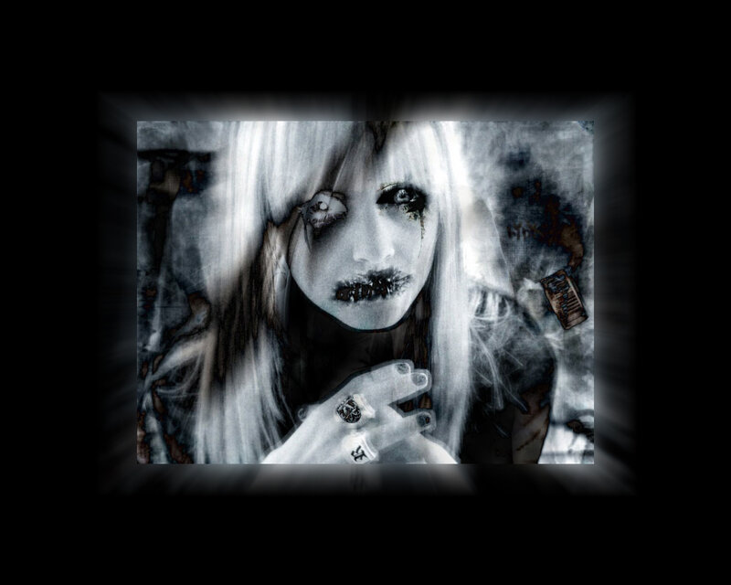 ghostly woman with dark makeup