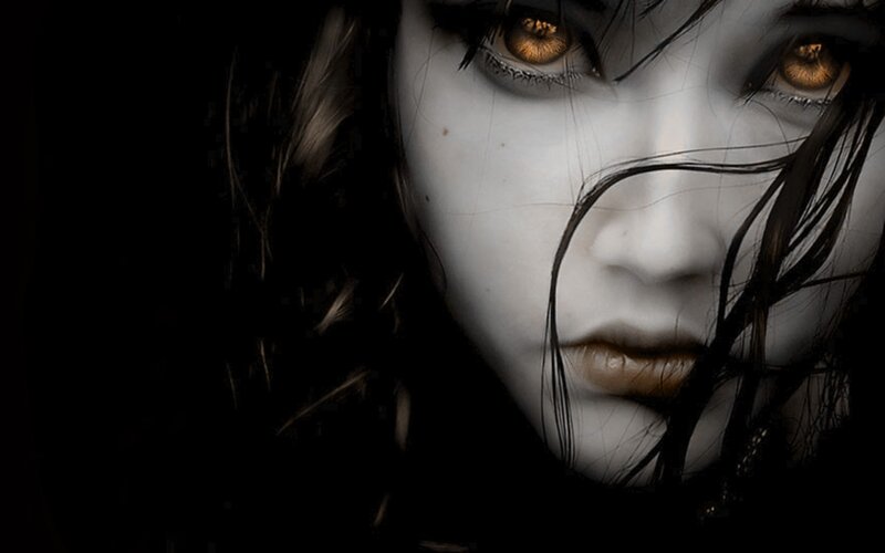 ghostly woman with glowing eyes