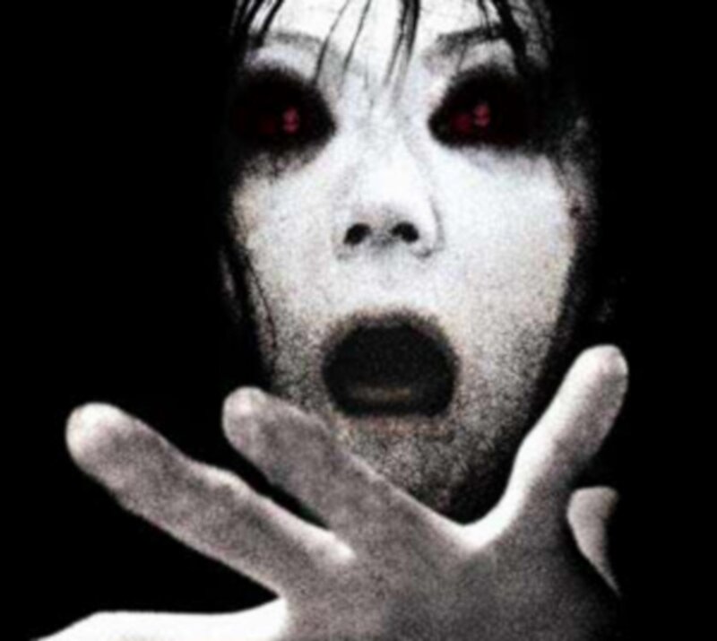 Ghostly Woman with Red Eyes