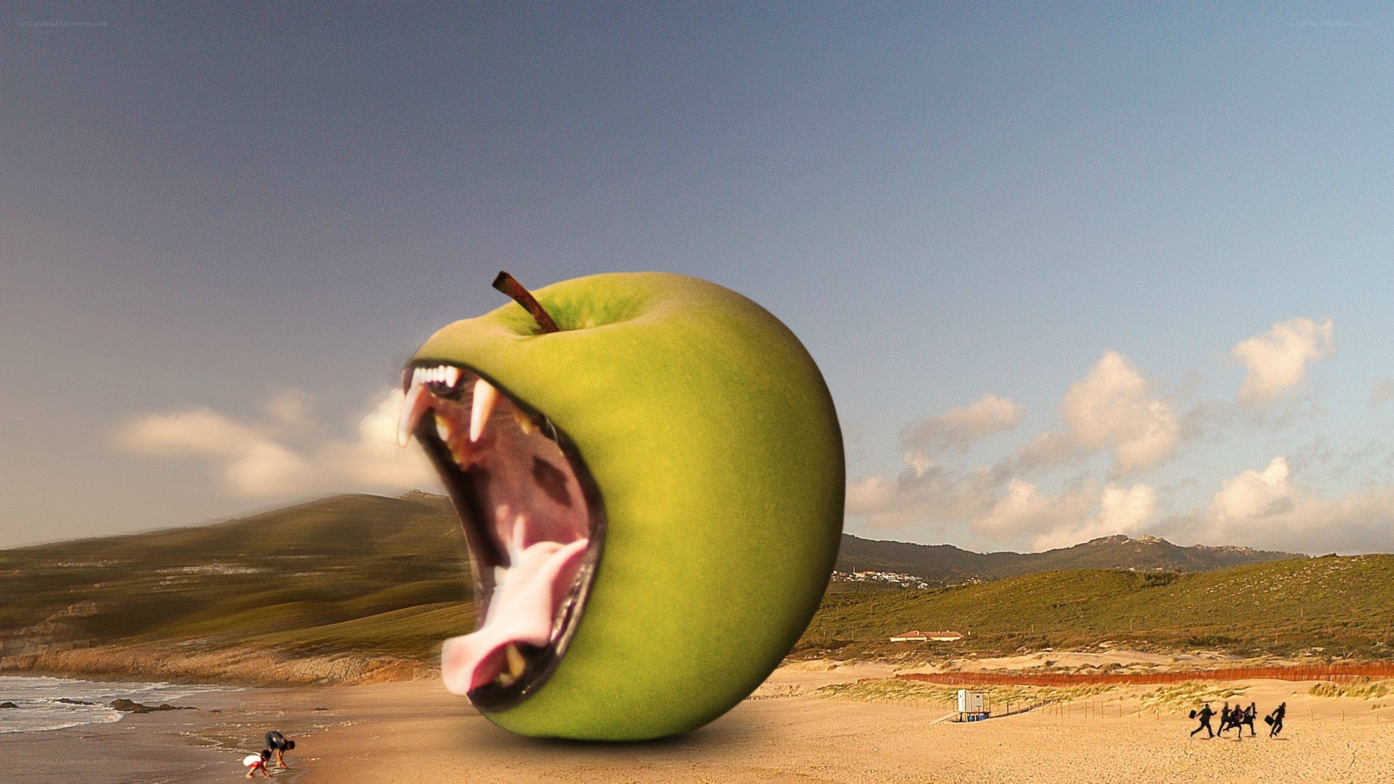Giant apple monster on beach