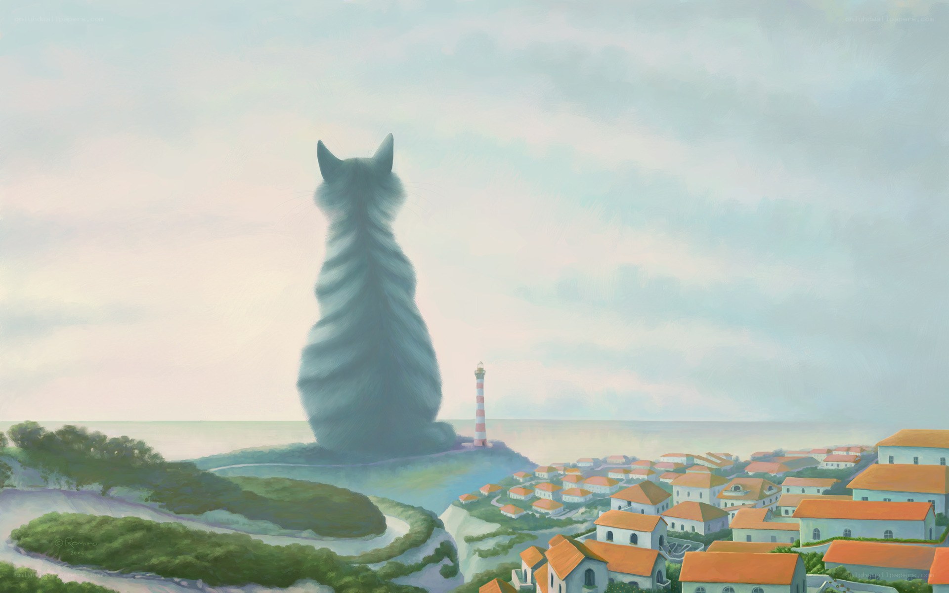 Giant cat overlooking coastal town