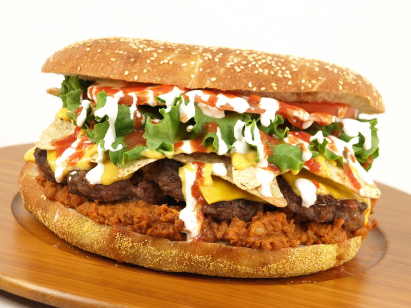 giant cheeseburger with toppings