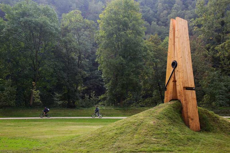 giant clothespin sculpture in park