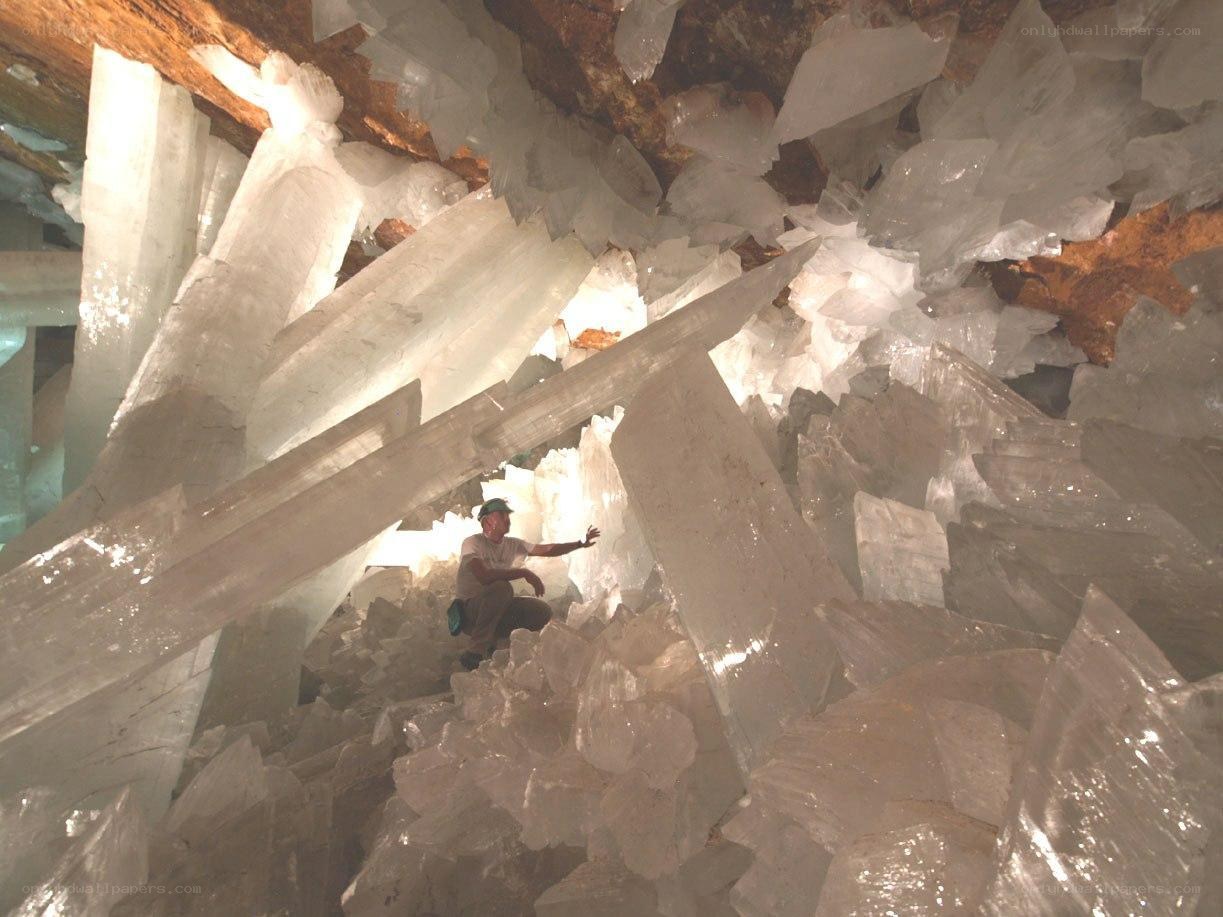 Giant crystal cave with person