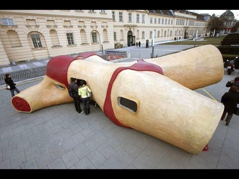 giant dog sculpture in city