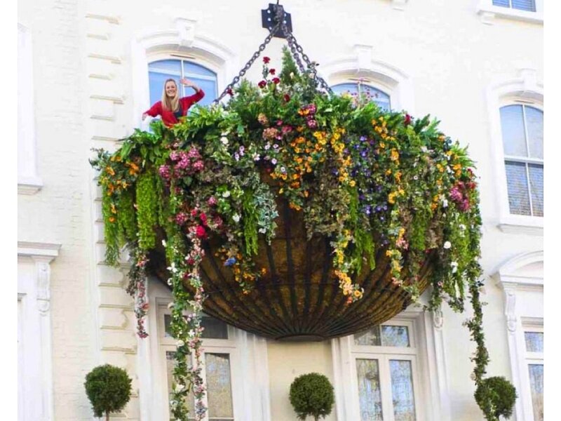 giant flower basket with woman
