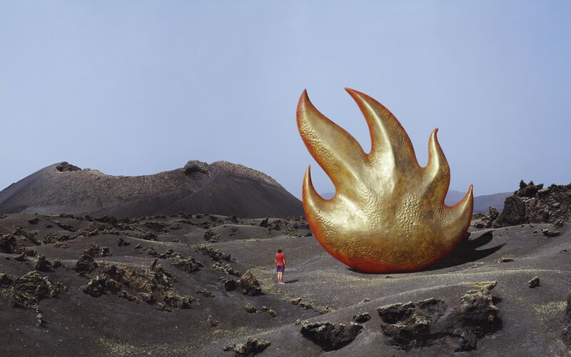Giant golden flame sculpture