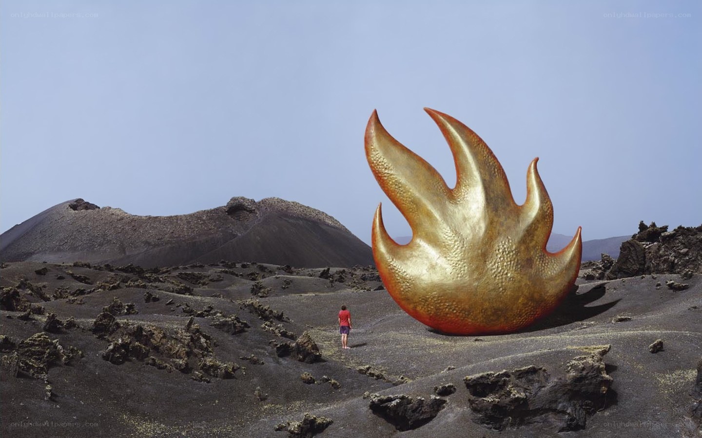 Giant golden flame sculpture