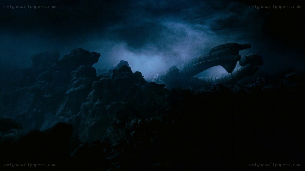 giant hand in dark landscape