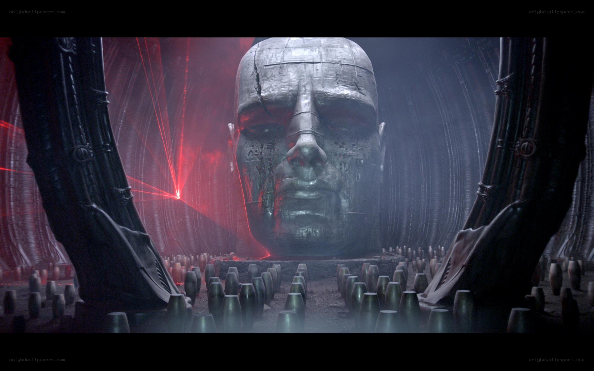 giant head in a dark chamber