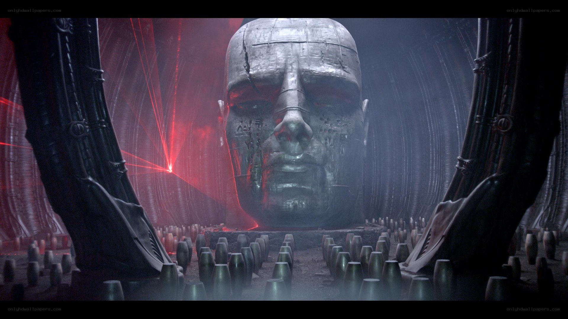 giant head in dark chamber