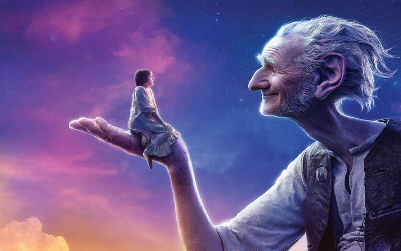 giant holding child in hand