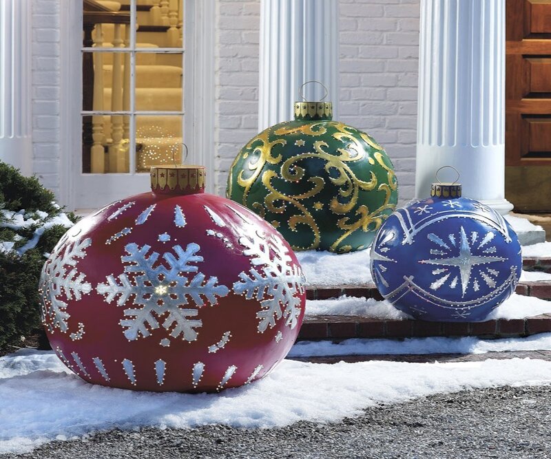 giant holiday ornaments outside