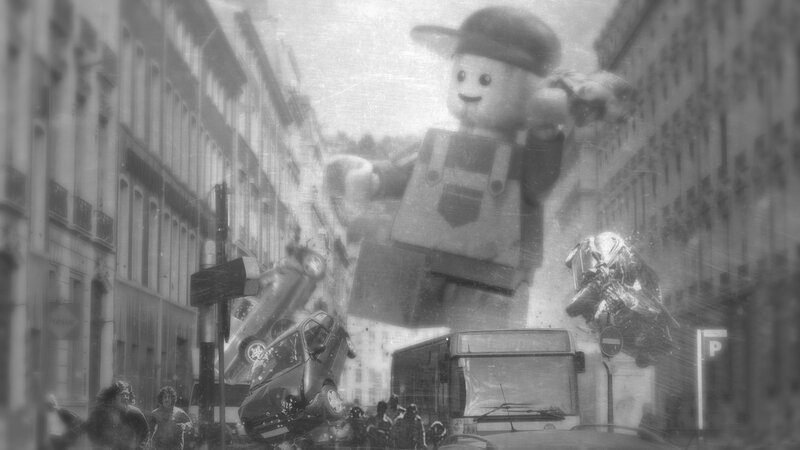 Giant Lego Figure in City