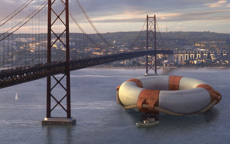 giant lifebuoy near suspension bridge