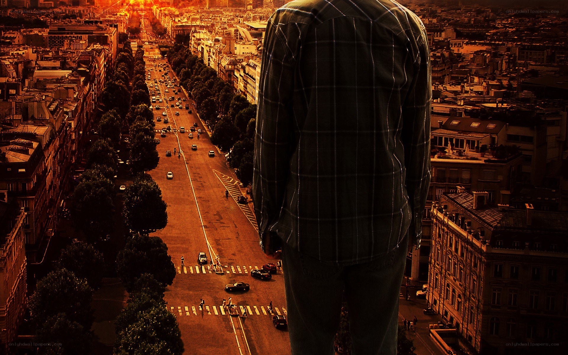 giant man overlooks city