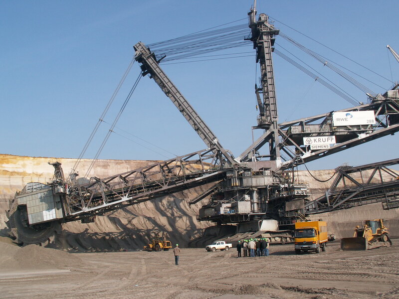 Giant Mining Excavator — Brown, Industrial, Afternoon, Photograph, People