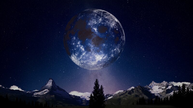 Giant Moon over Mountains