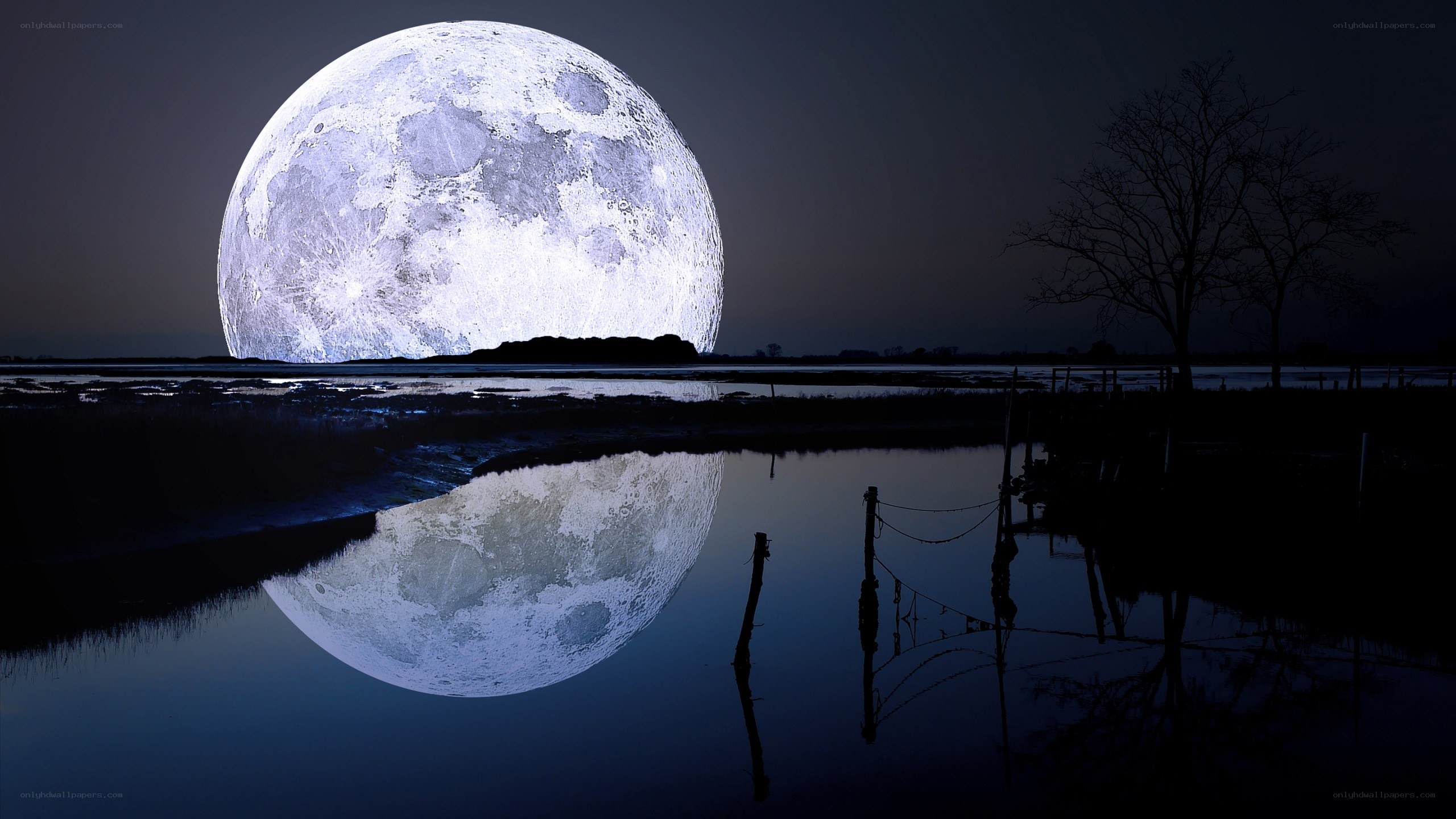Giant moon over water