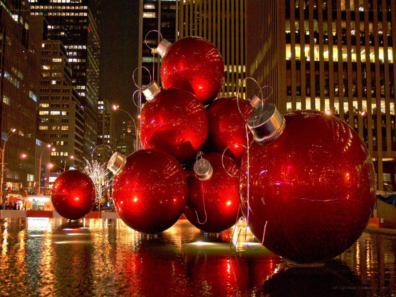 Giant red ornaments in city