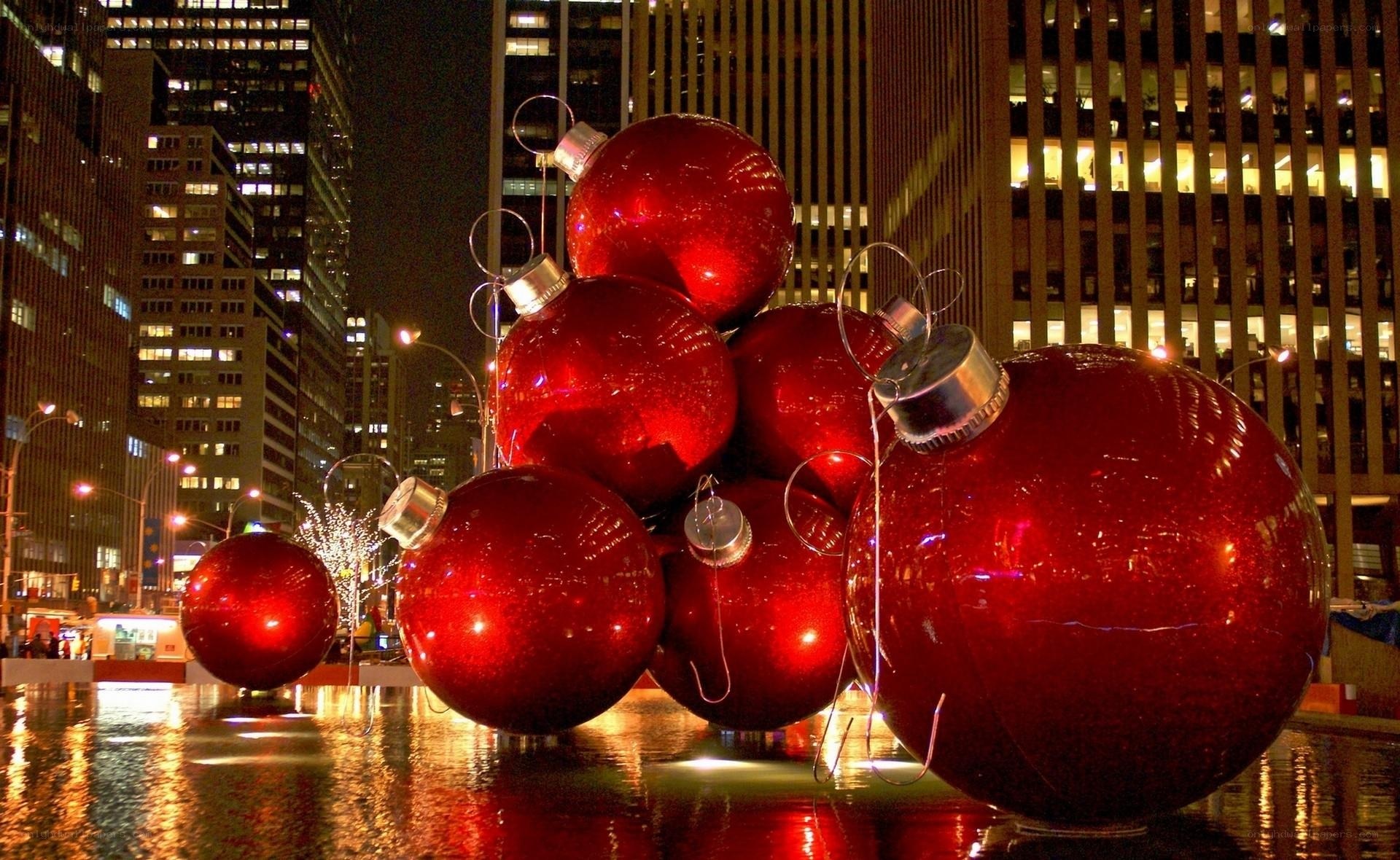 Giant red ornaments in city