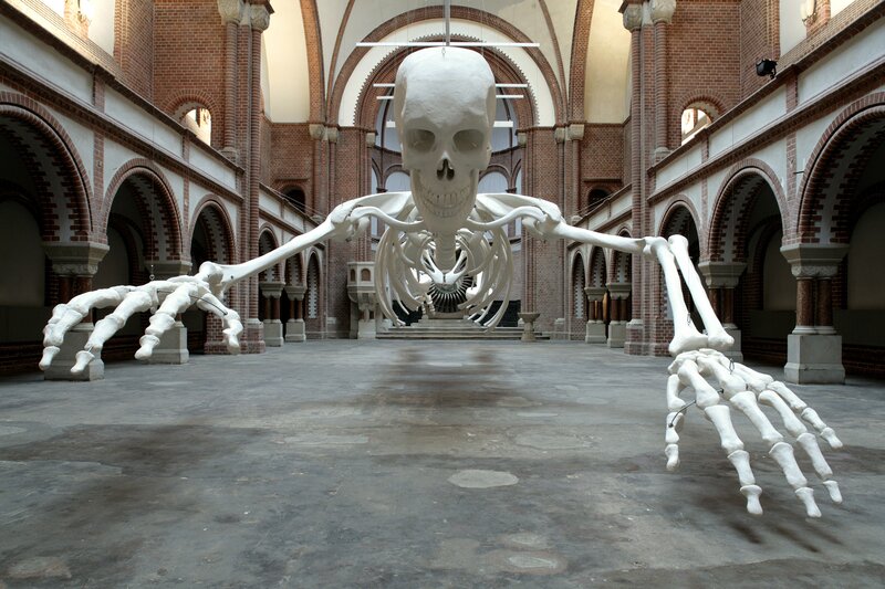 Giant skeleton sculpture in hall