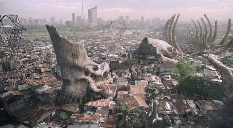 giant skull in ruined city