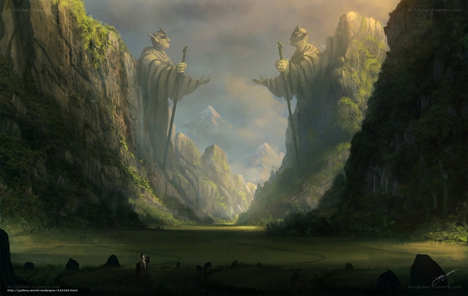 Giant statues in a mountain valley