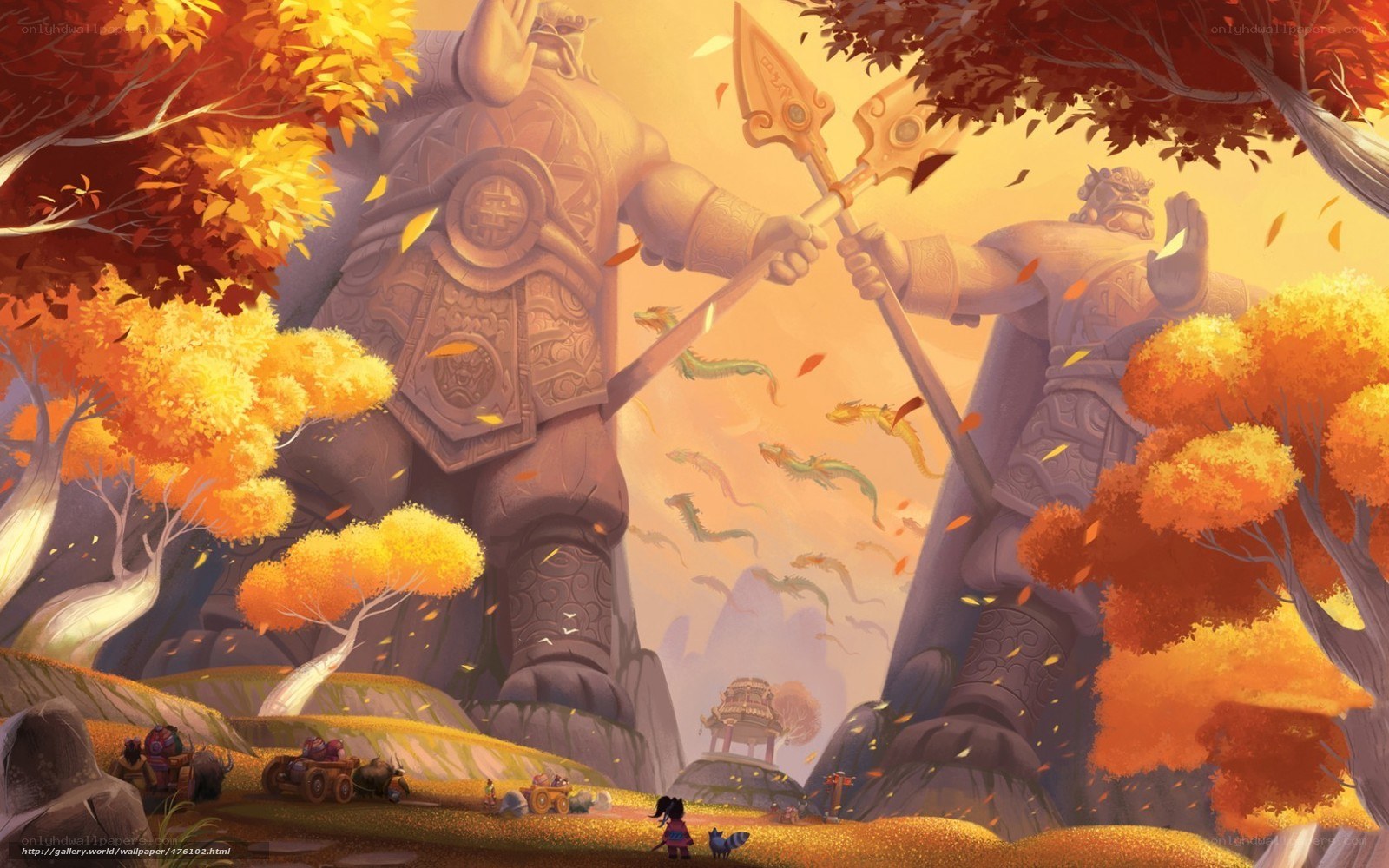Giant statues in autumn forest