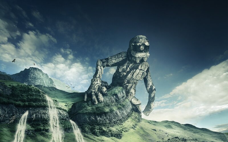 giant stone statue in mountains