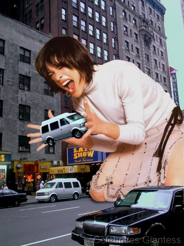 giant woman holding toy van