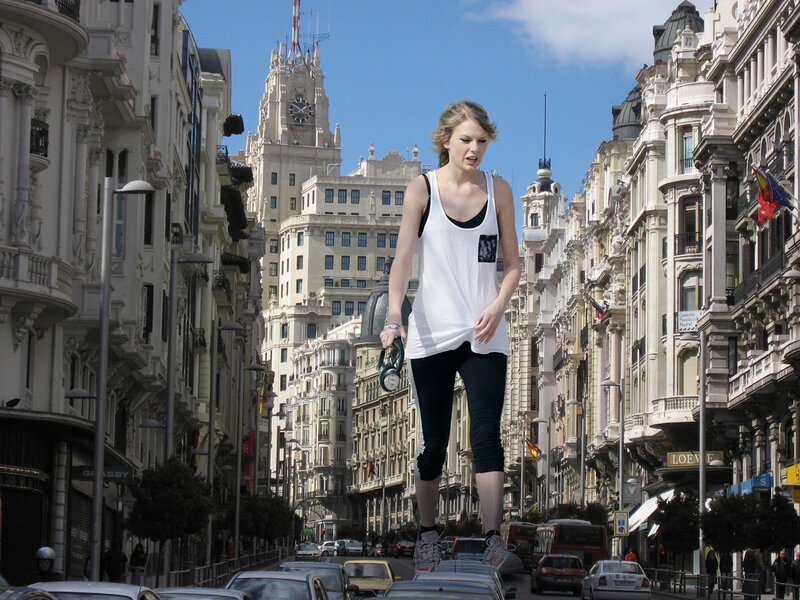 giant woman in city street