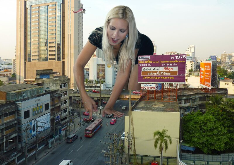 giant woman in city street