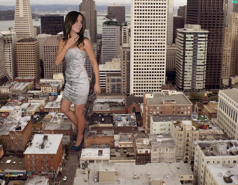 giant woman in cityscape
