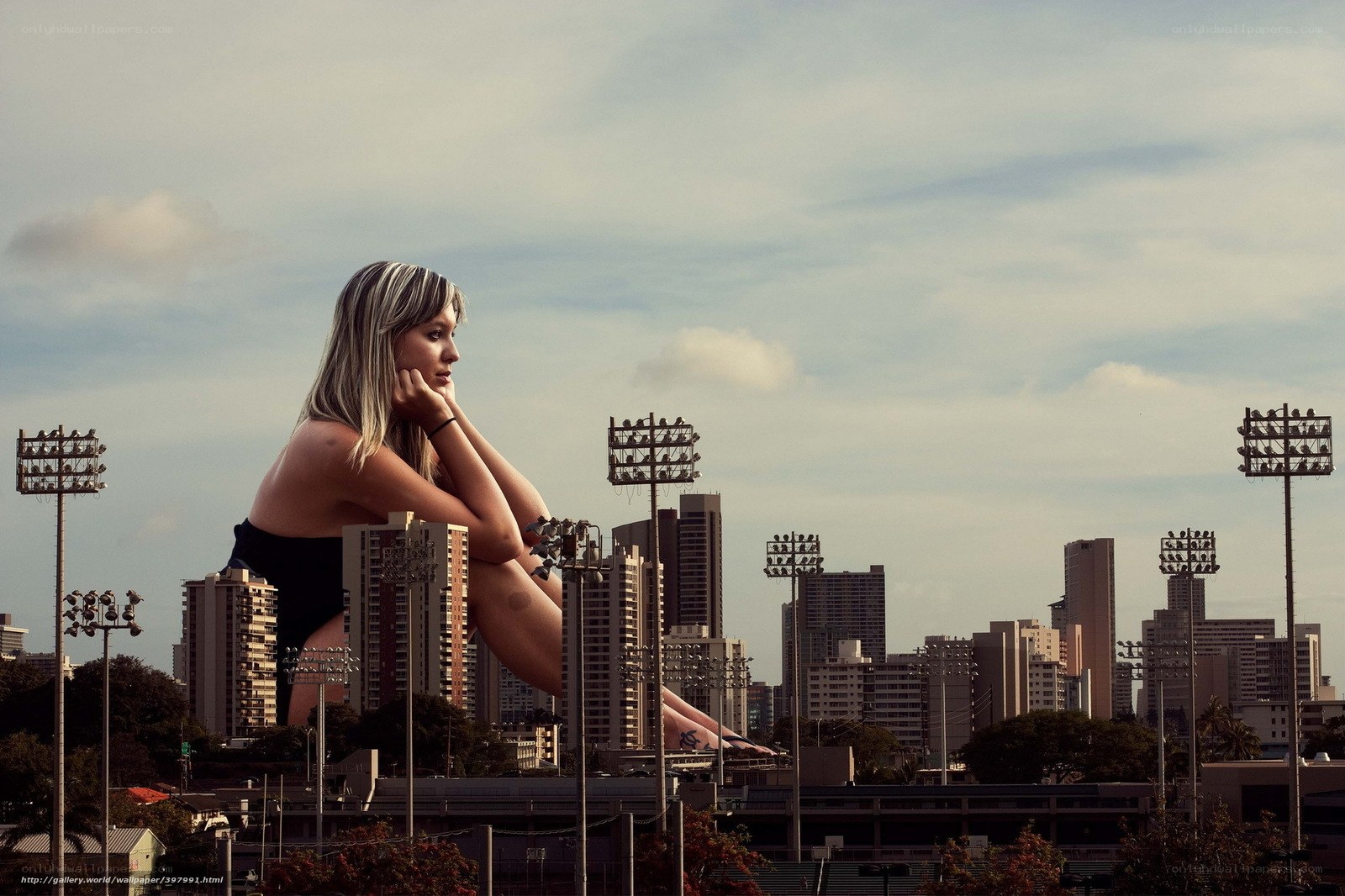 giant woman in cityscape